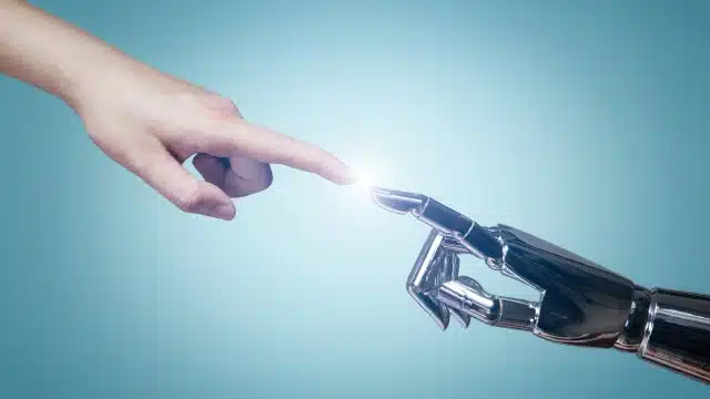 Connessione tra mano umana e robotica: innovazioni dell'intelligenza artificiale in odontoiatria allo Studio Odontoiatrico Del Malvò Torino.